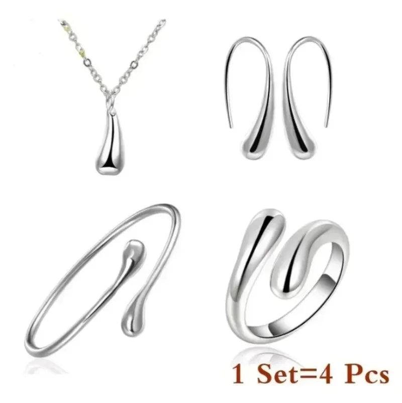 Conjunto de 4 pendientes, anillo y pulsera de plata de ley 925 con forma de gota de agua para mujer, elegante conjunto de joyería de lujo de cuatro piezas, regalo de fiesta o boda.