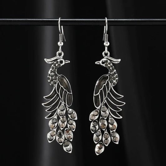 Pendientes étnicos vintage de pavo real para mujer, elegantes pendientes colgantes de color plateado con diamantes de imitación y aceite, joyería para fiesta.