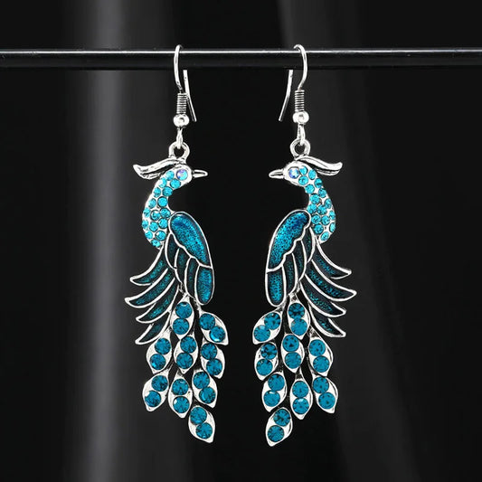 Pendientes étnicos vintage de pavo real para mujer, elegantes pendientes colgantes de color plateado con diamantes de imitación y aceite, joyería para fiesta.